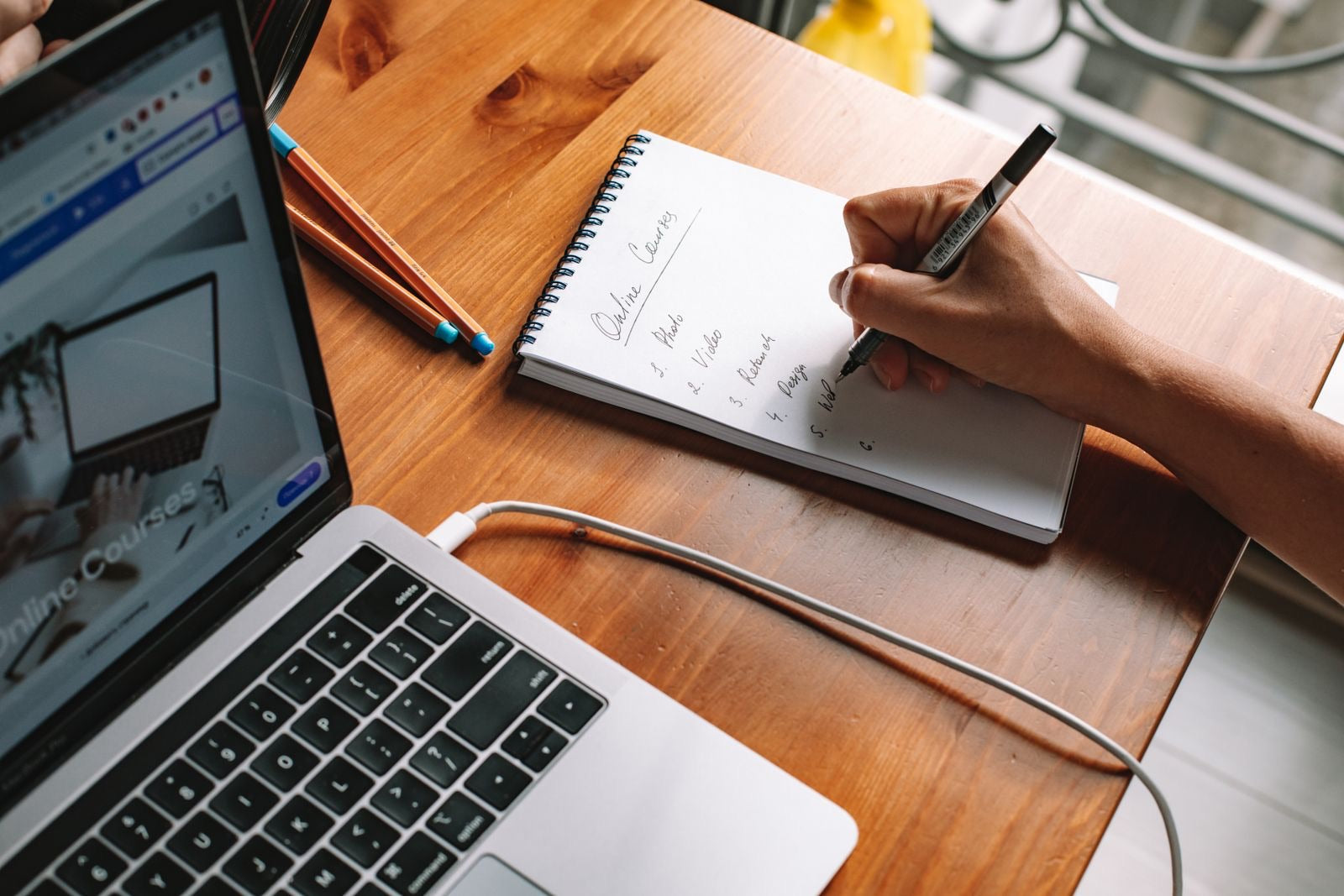 A professional researching online courses to earn PDUs for PMP renewal.